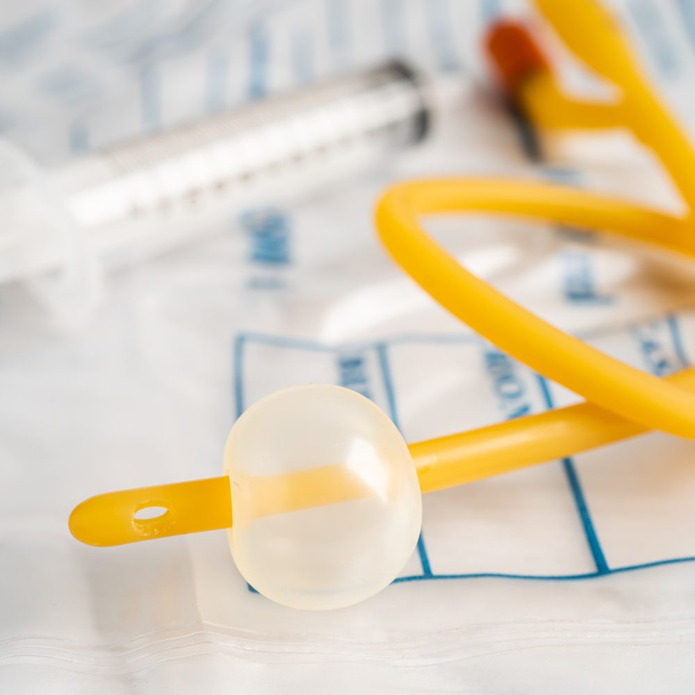 Foley urinary catheter with urine bag for disability or patient in hospital.